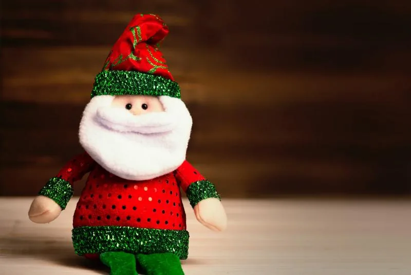 A plush Santa Claus toy.